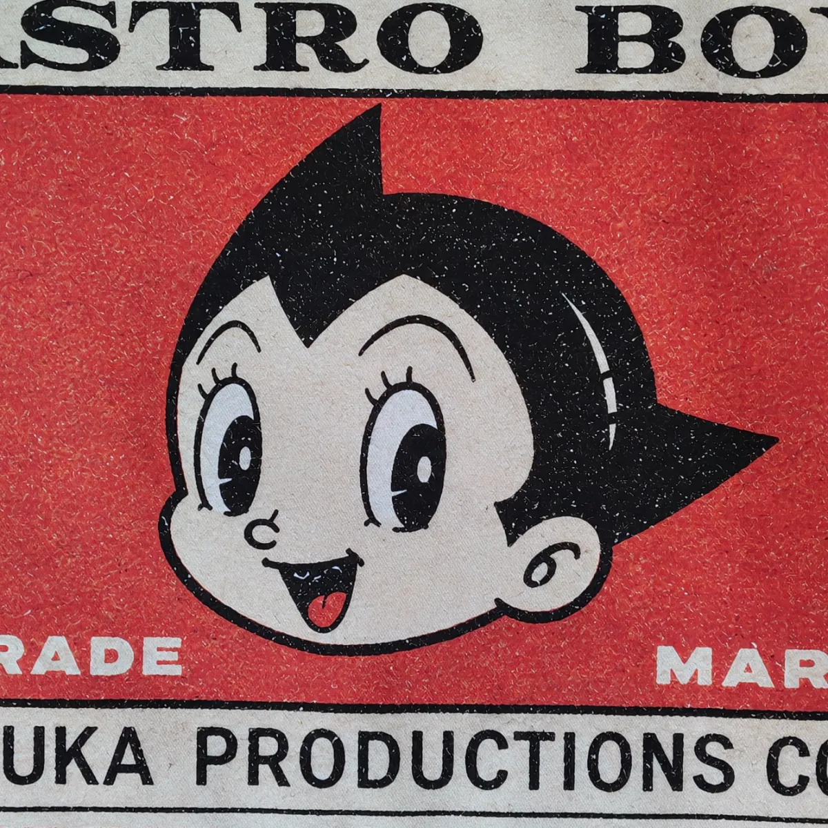 Astro Boy retro matchbox poster with crafted wooden frame.